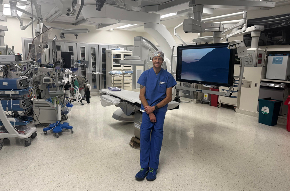 Chris Naimo poses in an operating room at Penn Presbyterian Medical Center